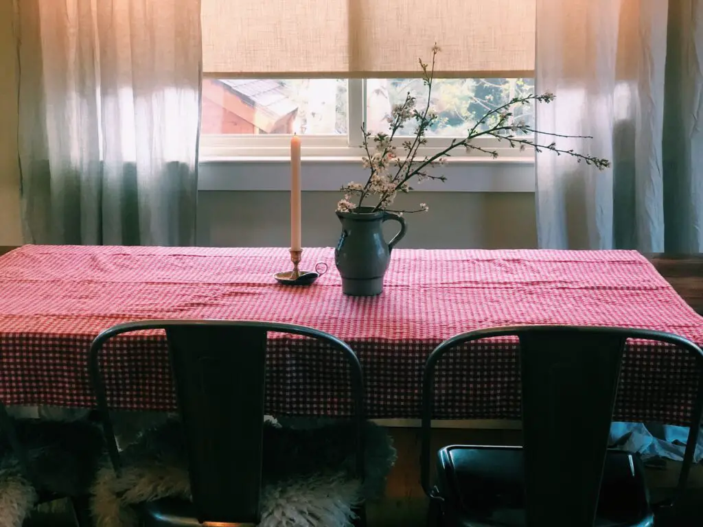 table with candle and flowers