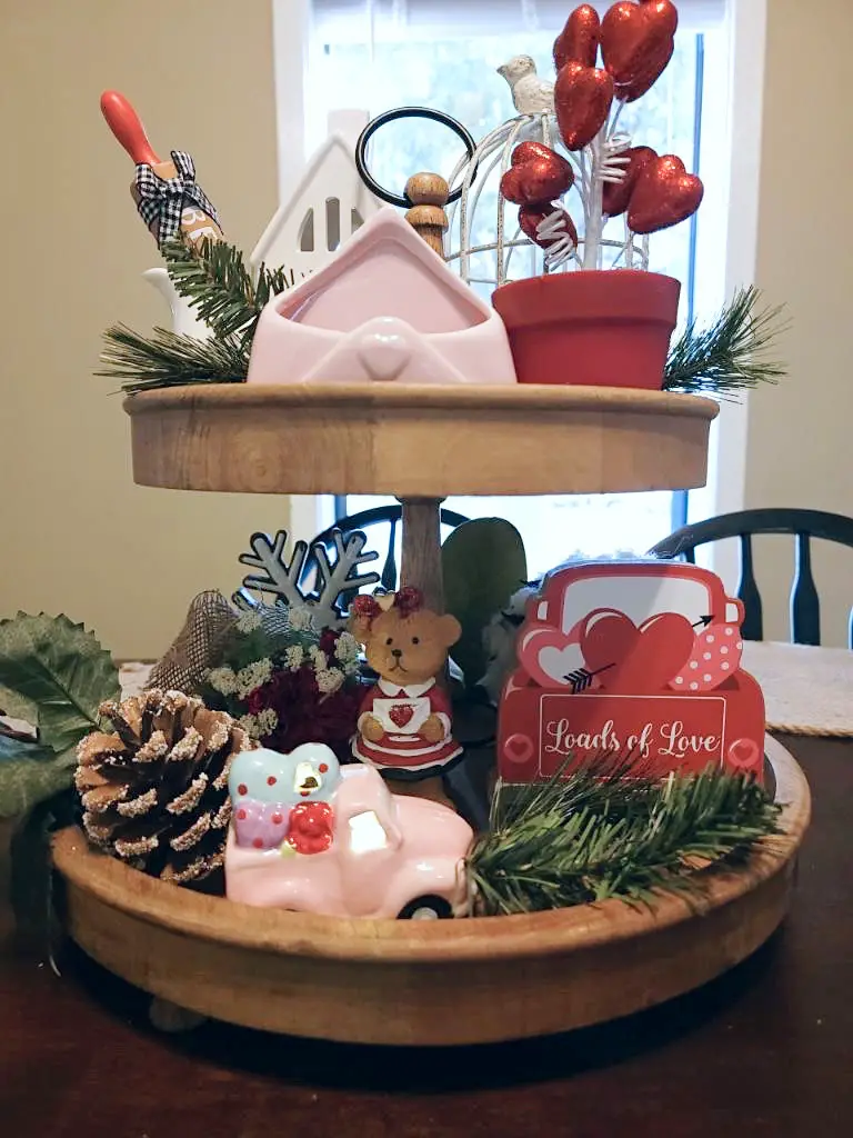 Tiered tray with both winter and Valentine's Day decorations