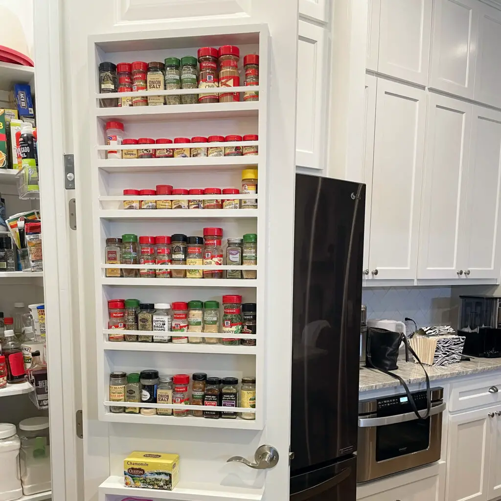 Spice rack holder on the back of pantry door