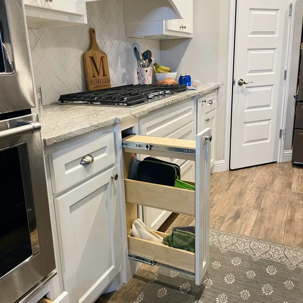 Pull out drawers framing the stove