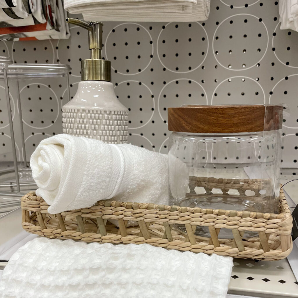 Wicker bathroom tray with neutral accents