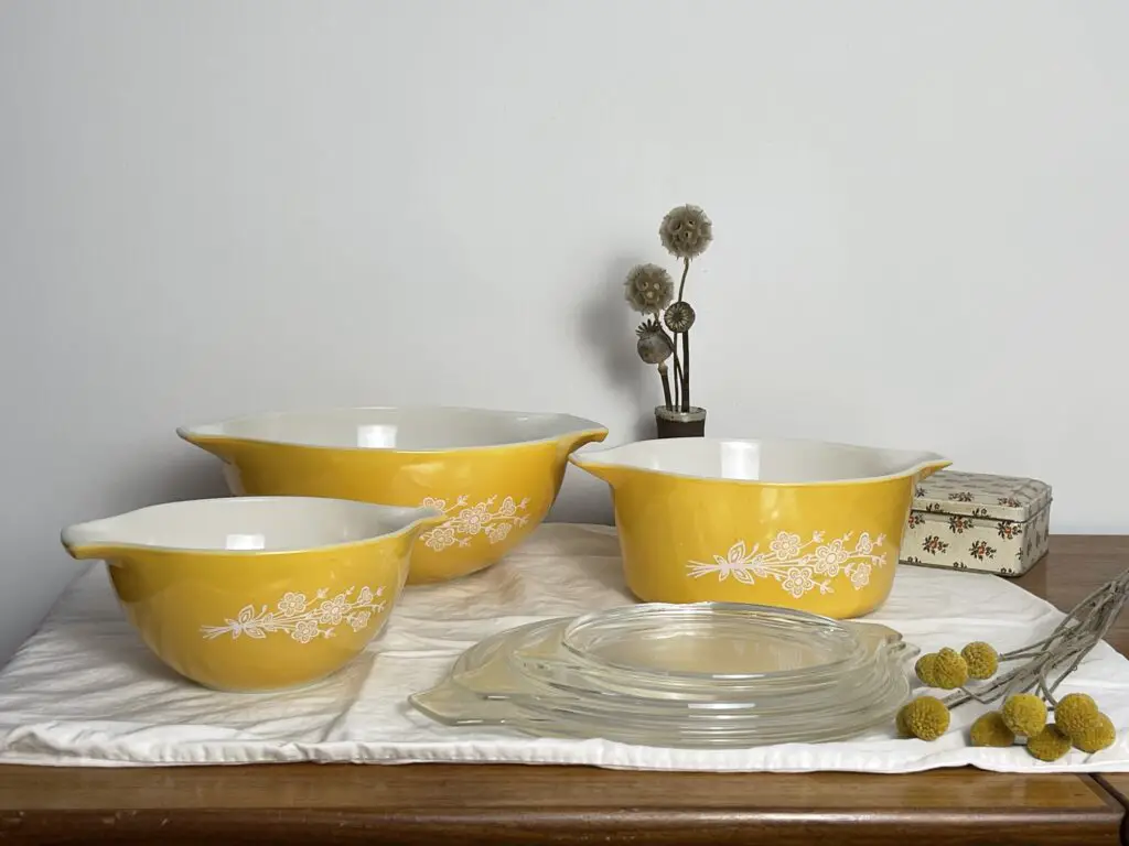 sunny yellow pyrex dishes on a table