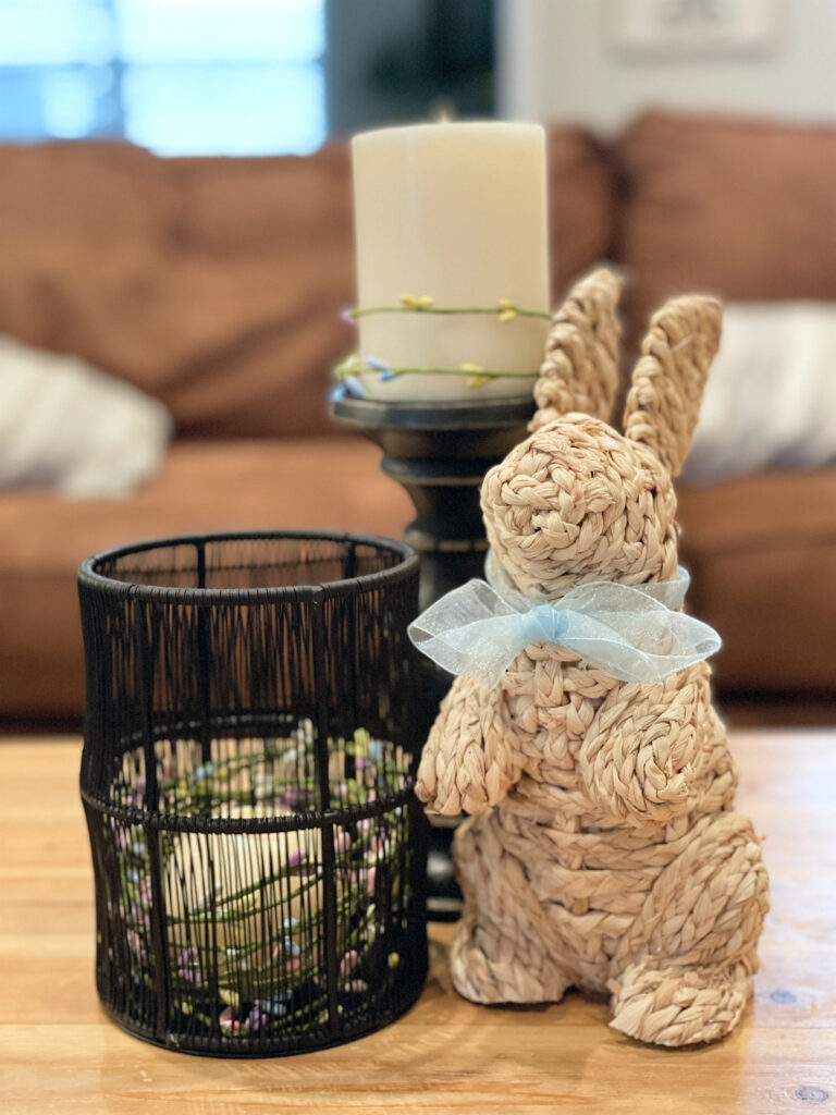 Wicker Easter bunny and candles with a pop of pastel colors