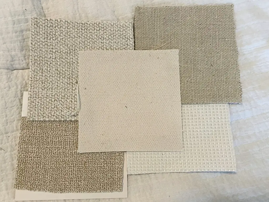 Beige, linen and white fabric samples