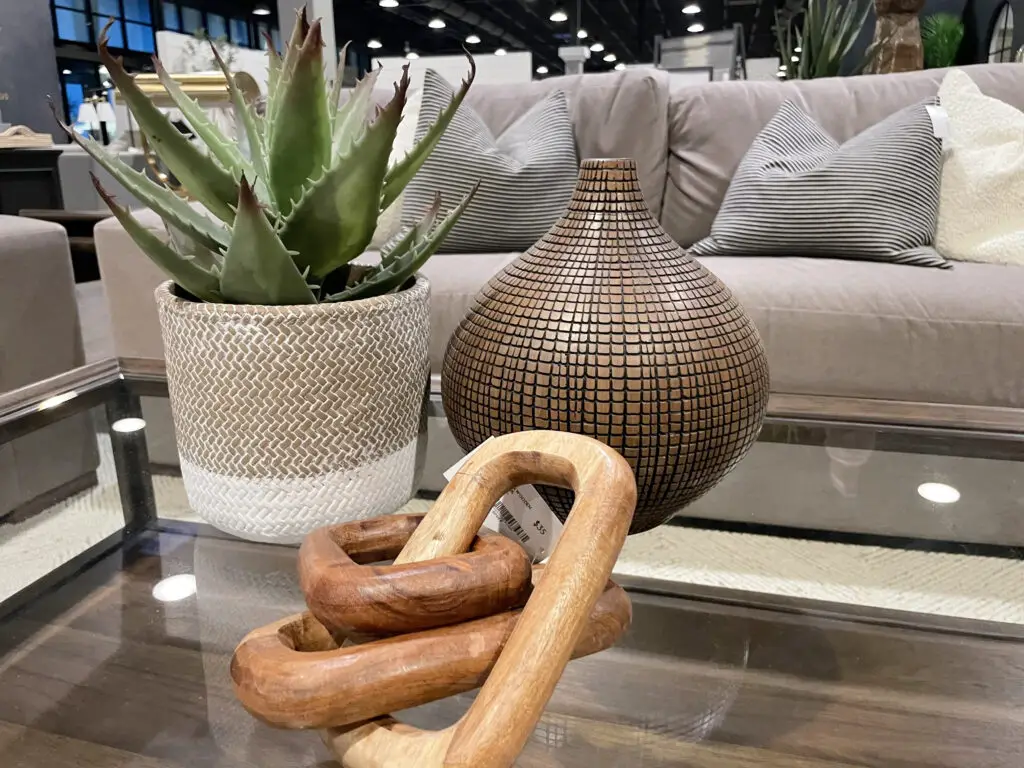 rounded wood vase, succulent, and oversized wooden links