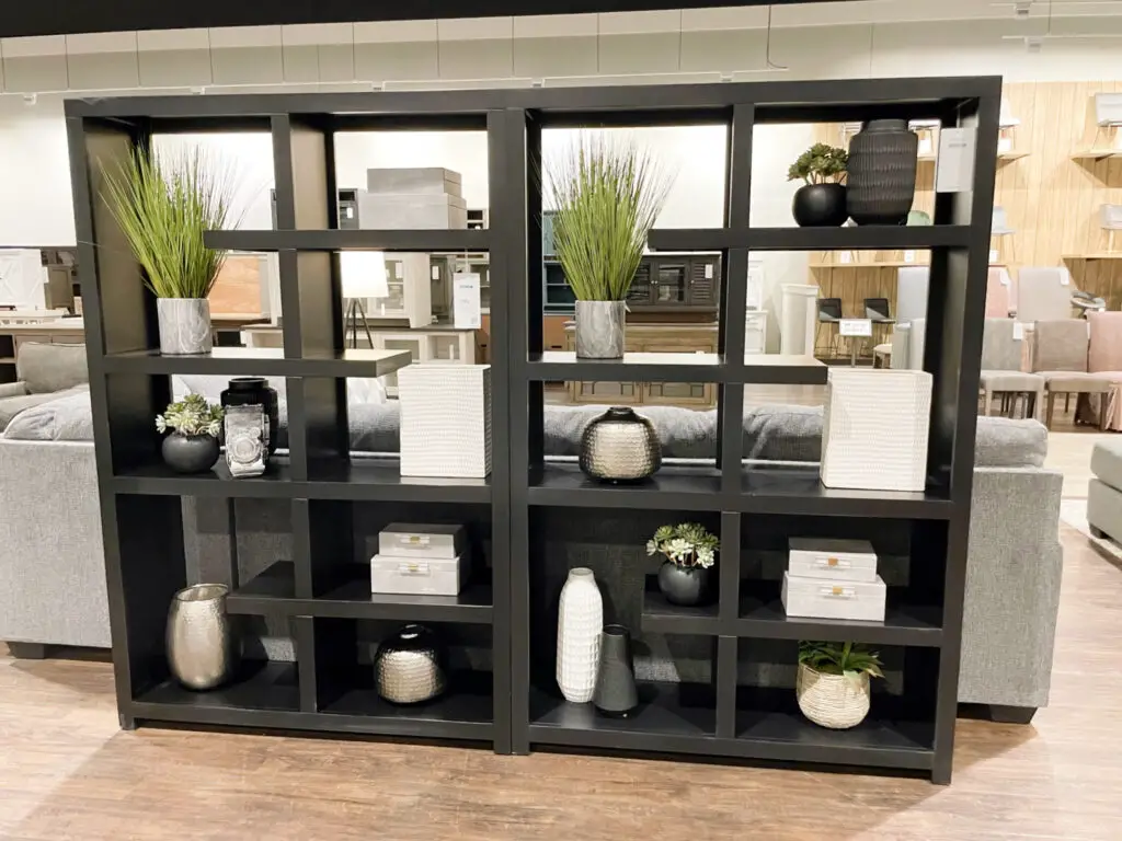abstract black shelving with white, grey and black decorations