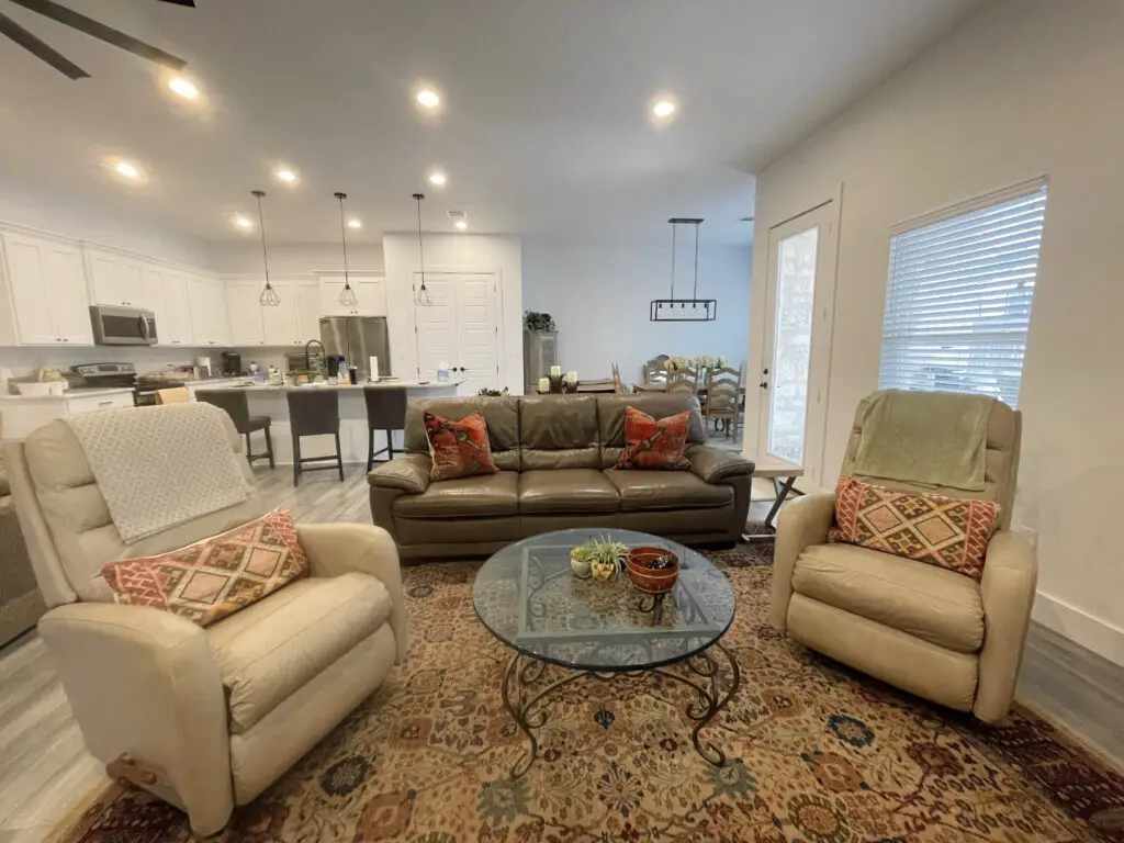 Ecclectic living room with patterned rug and pillows