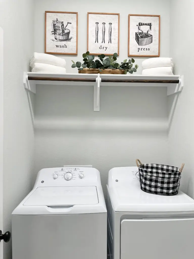 Clothing rod shelf above washer and dryer