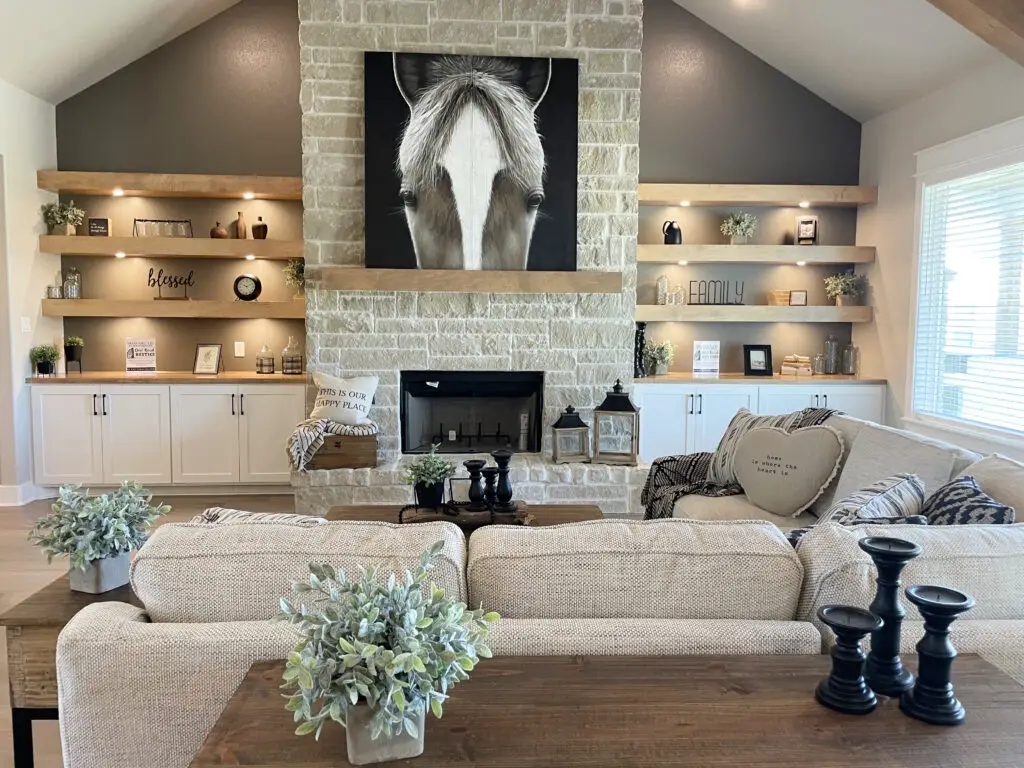 neutral fireplace decor with built ins on either side