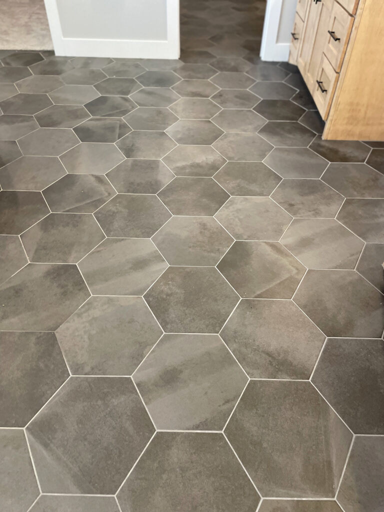 Large Grey Hexagon tile flooring in the bathroom
