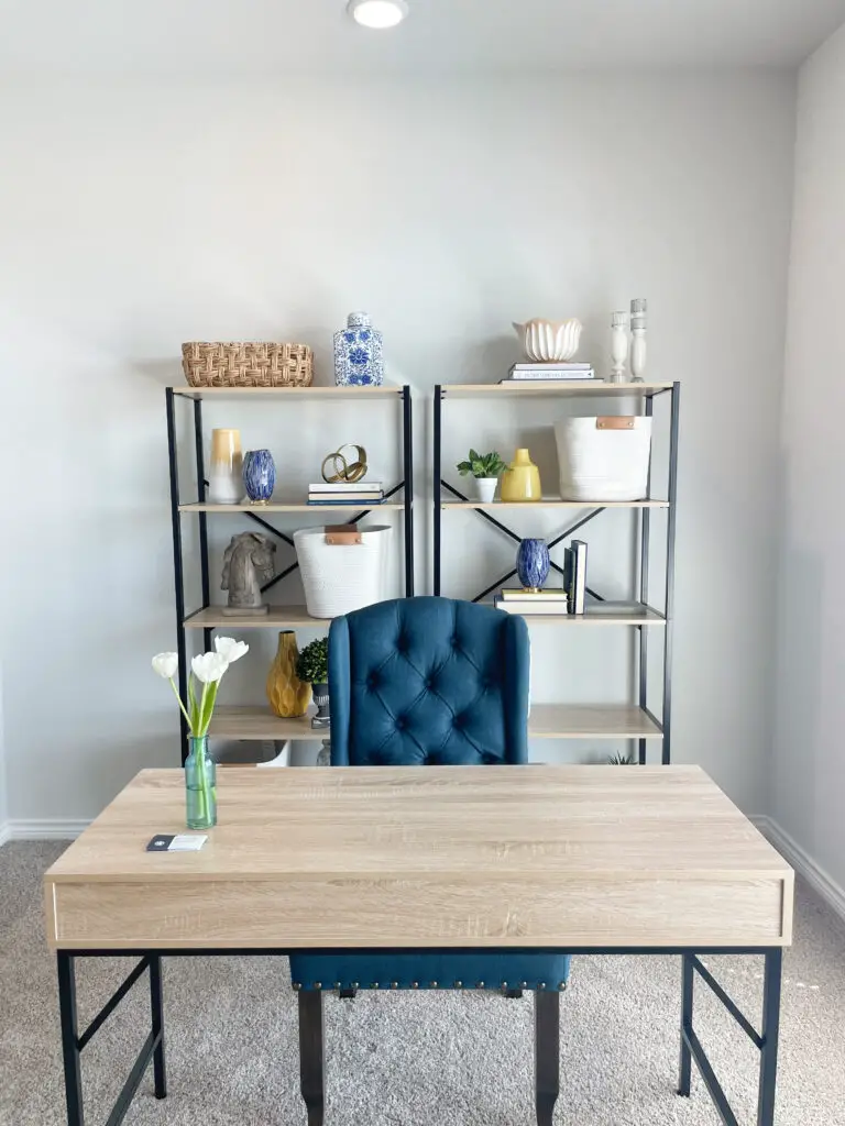 Industrial shelves and desk with bright yellow and blue accents in home office