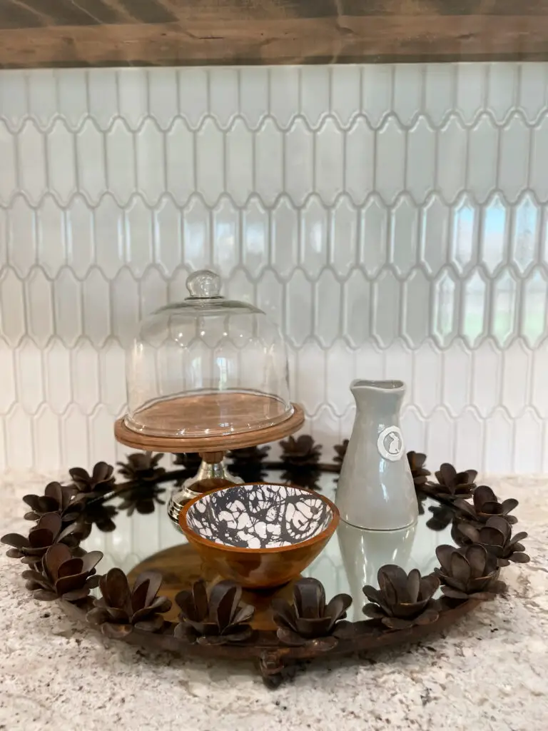 brown and glass tray with different brown hue decorations