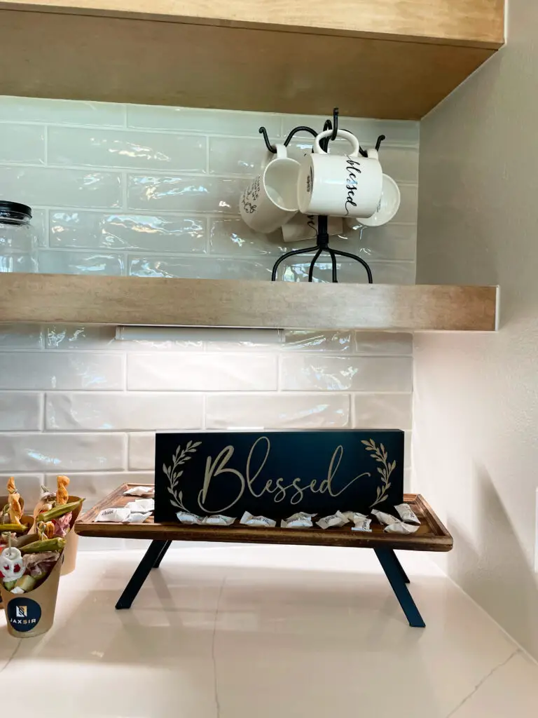 Glazed ceramic tile kitchen backsplash behind open shelves