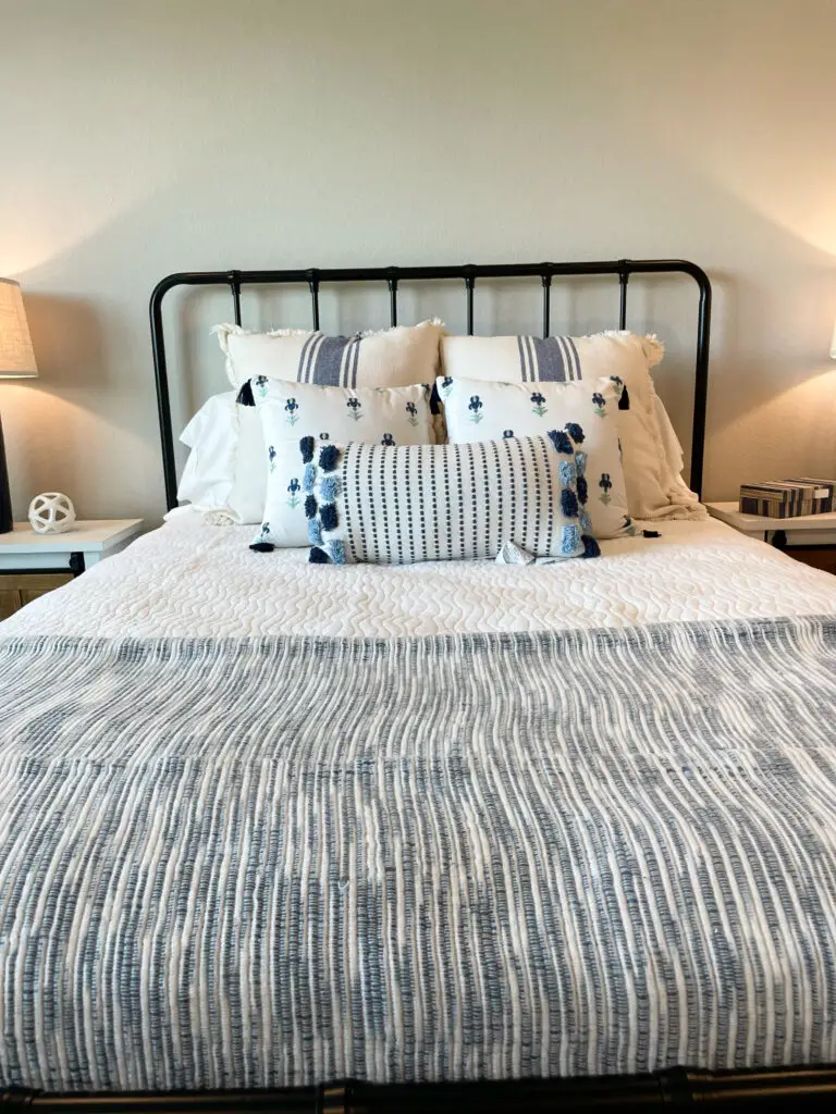 Curated blue and white farmhouse bedding