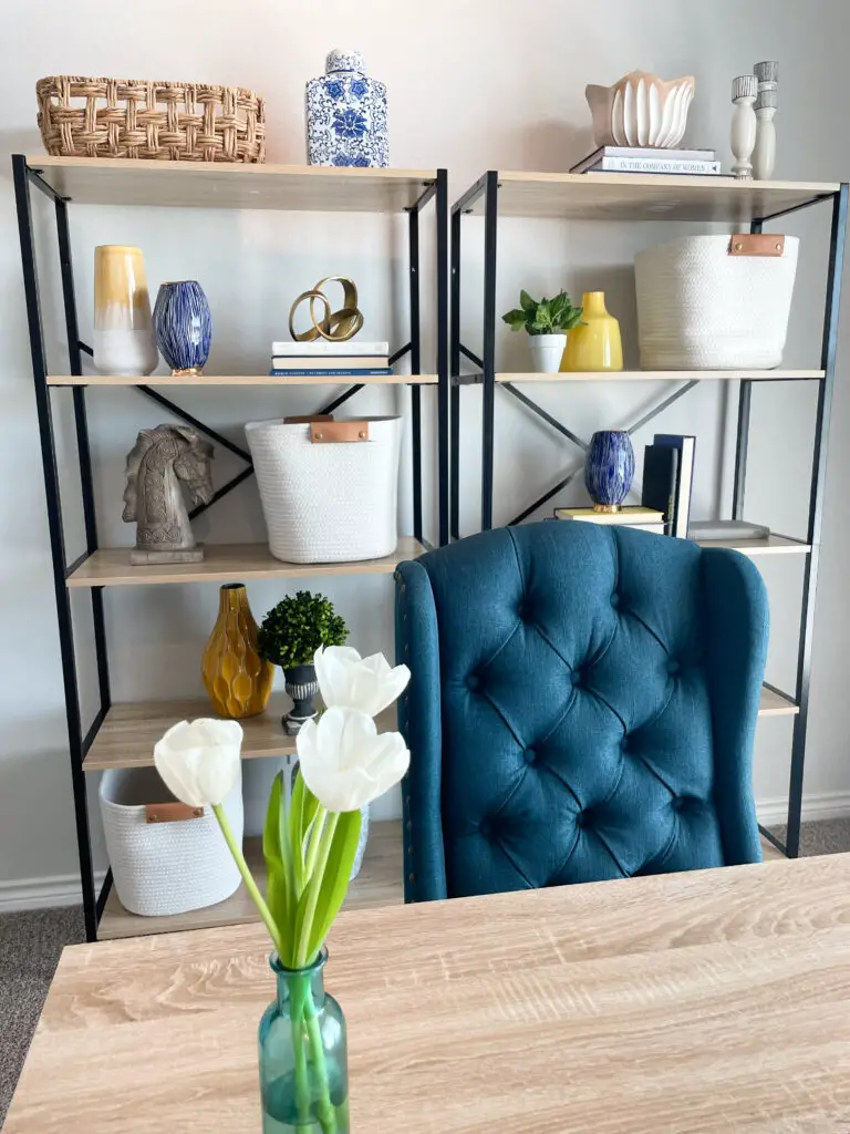 blue and yellow office theme with curated book shelf decorations
