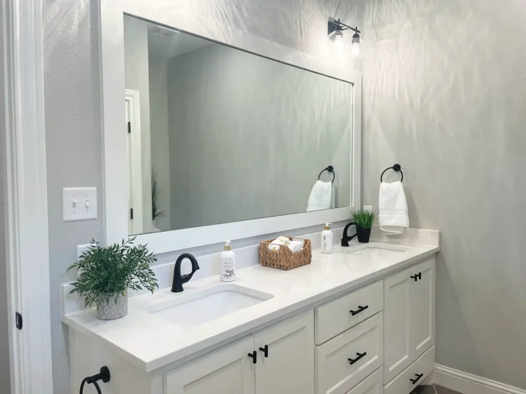 white bathroom with minimal modern farmhouse bathroom decor