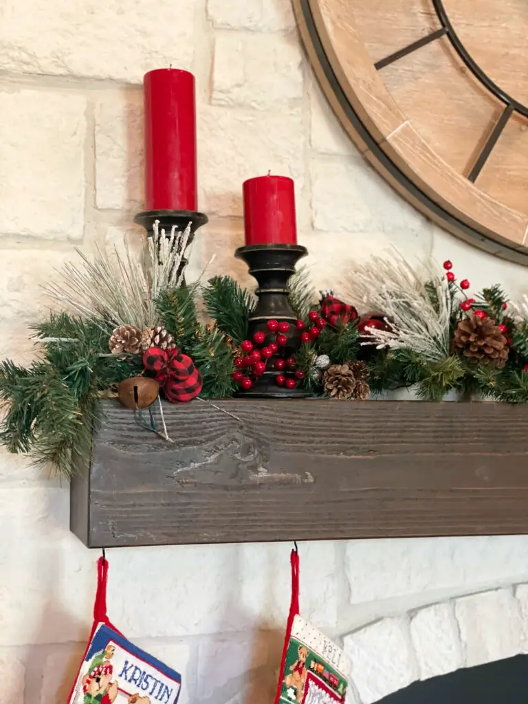 Christmas Garland with Christmas decorations on fireplace mantel
