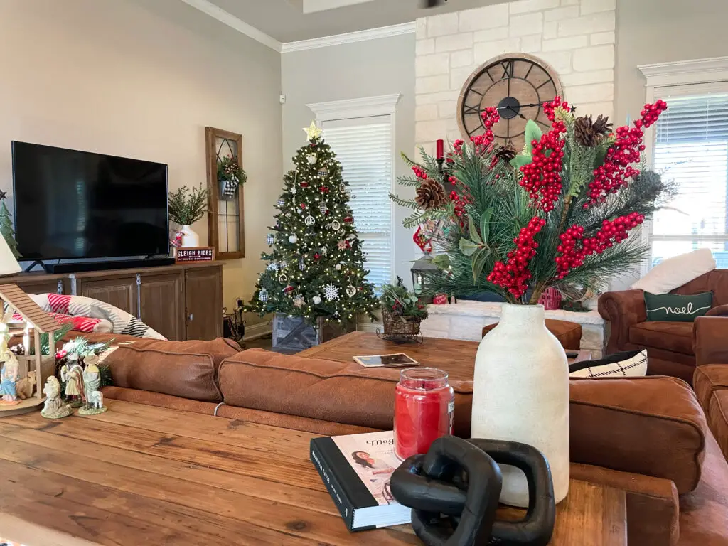 modern farmhouse living room filled with Christmas decorations