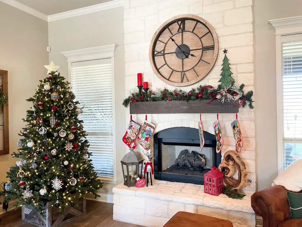 Christmas tree next to fireplace