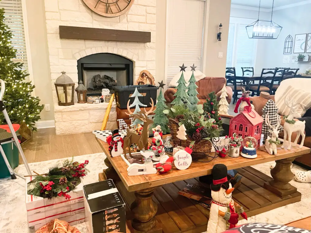 Christmas decorations gathered on coffee table