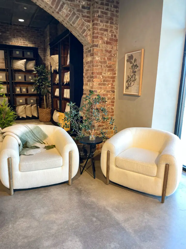 two organic shaped chairs in small seating vignette