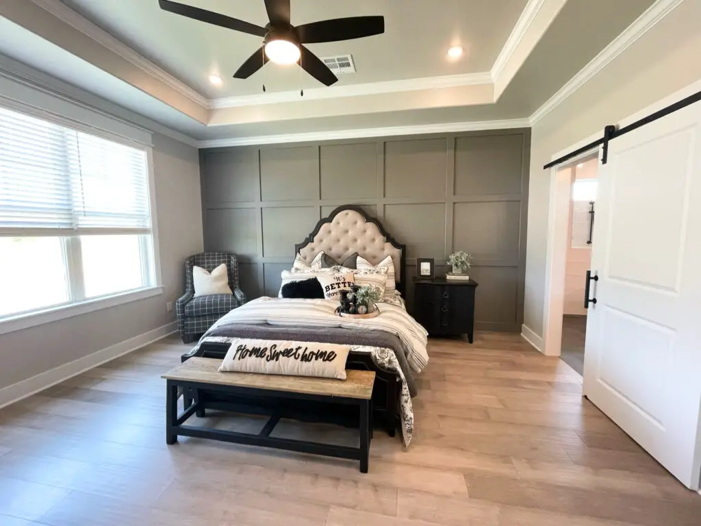 farmhouse bedroom with moody board and batten accent wall